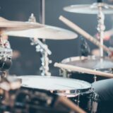 tilt shift photo of acoustic drum set